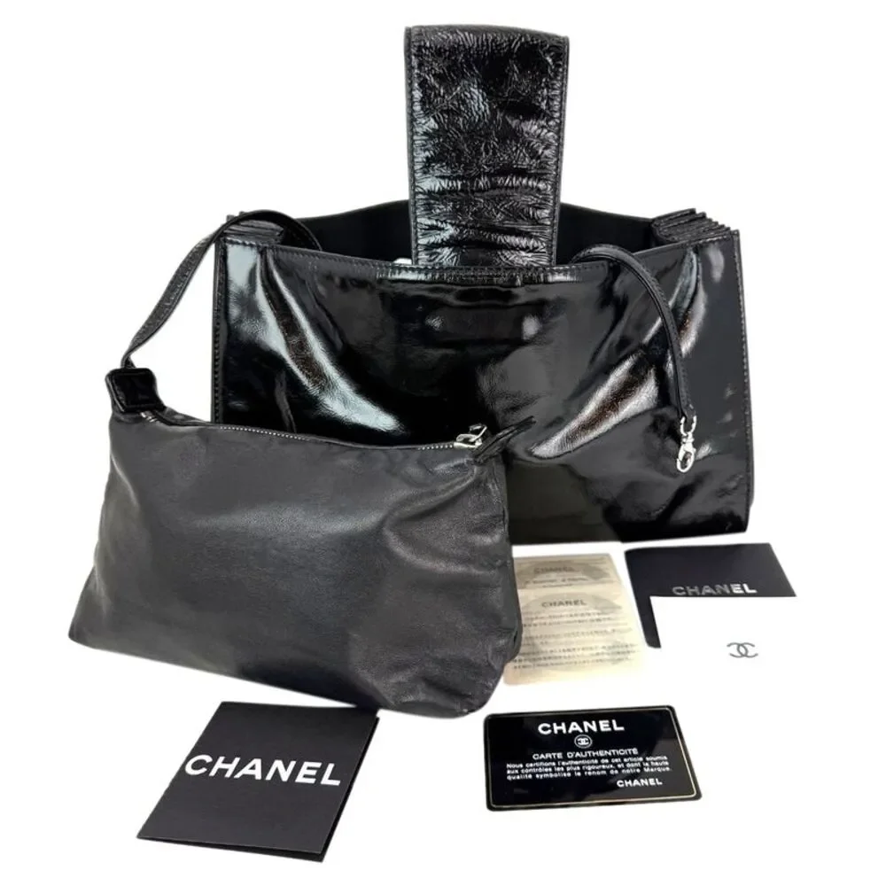Chanel Patent Mademoiselle lock Convertible Wrist Clutch Black Bag